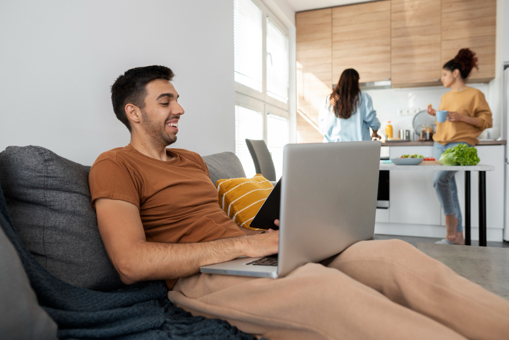 A small 5G gateway on a windowsill broadcasting Wi-Fi to a living room