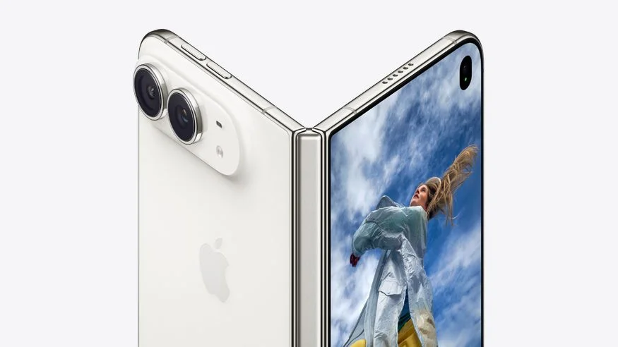 iPhone Duo in Star White, half open, showing its two rear cameras on one side and the inner screen on the other