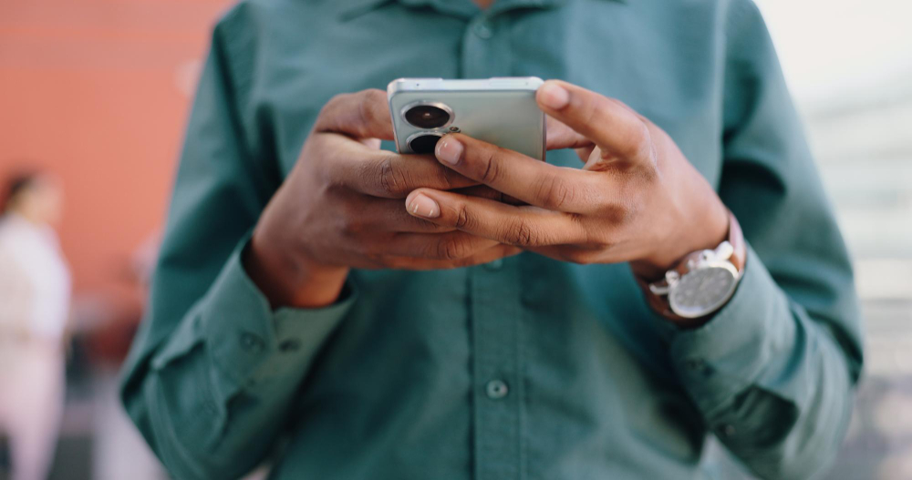 Close-up of hands holding a smartphone
